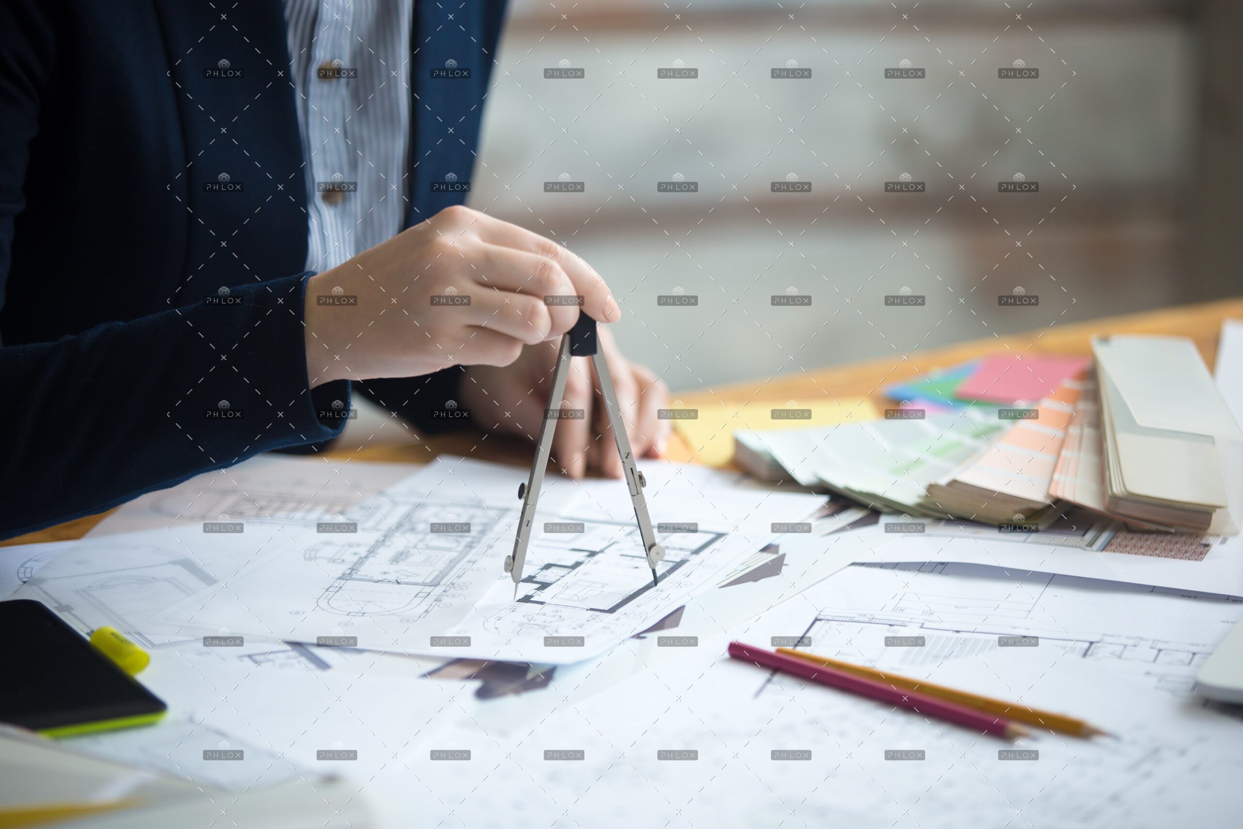 demo-attachment-13-female-architect-using-drawing-compass-PZNMCEU-min